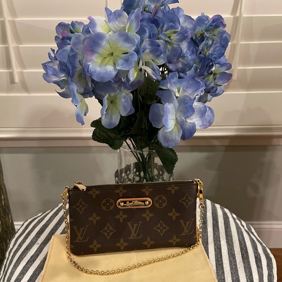 Louis Vuitton Milla Clutch - Picture 1 of 12